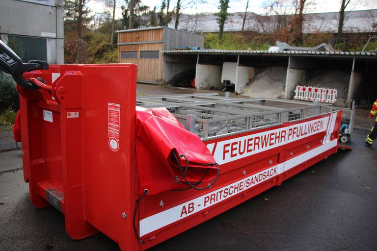 Abrollbehälter Sandsack & Energie