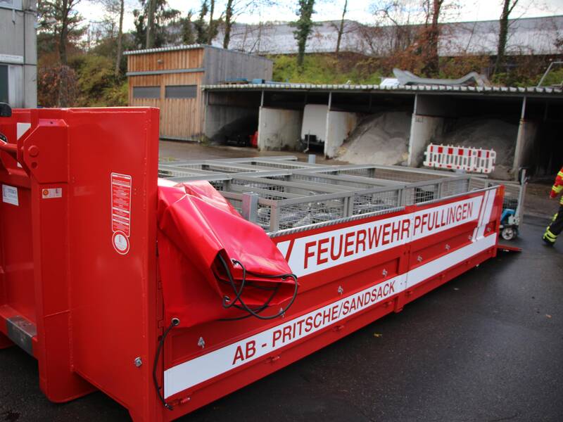 Abrollbehälter Sandsack & Energie